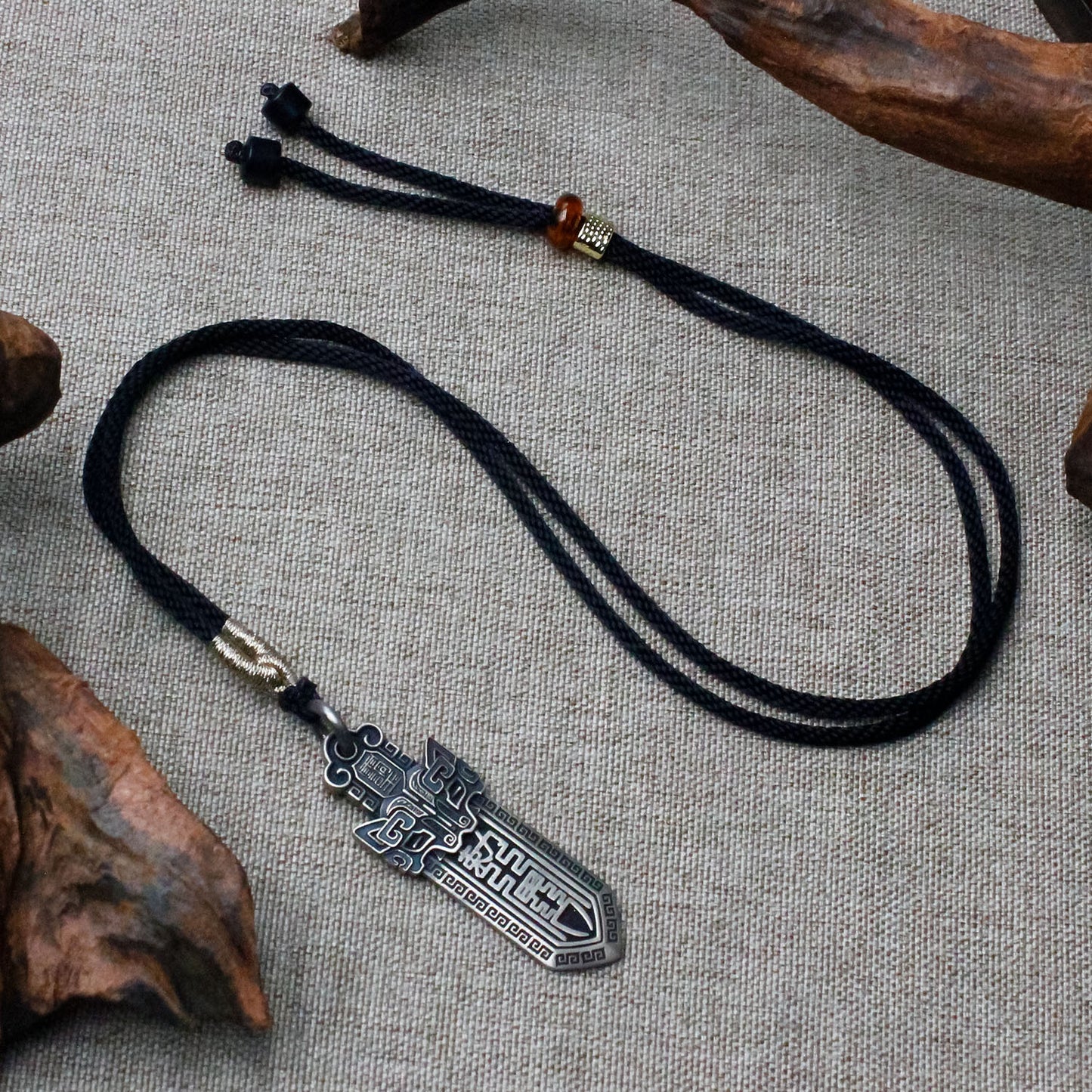 Taotie Rune Sword Pendant