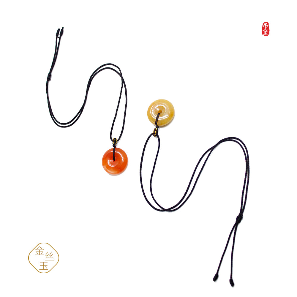 Golden jade safety pin